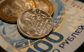 Рубль немного снизился к доллару и укрепился к евро